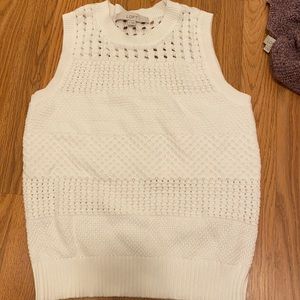 White sweater vest